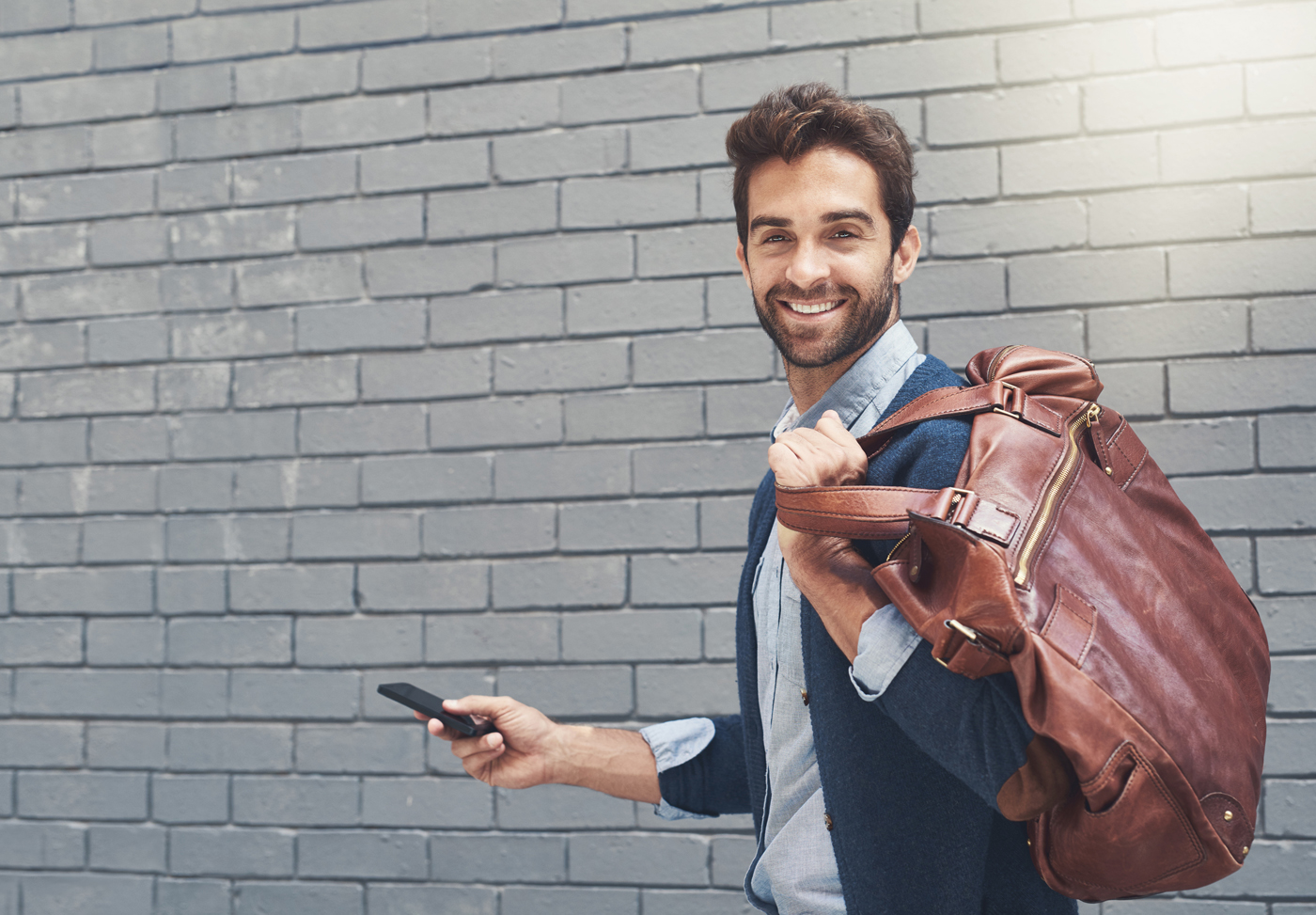 man-with-brown-bag-leather